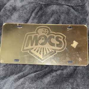 Gold UTC Mocs License Plate